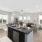 Virtually staged image of the kitchen with island 
