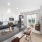 Virtually staged image of the kitchen with island 